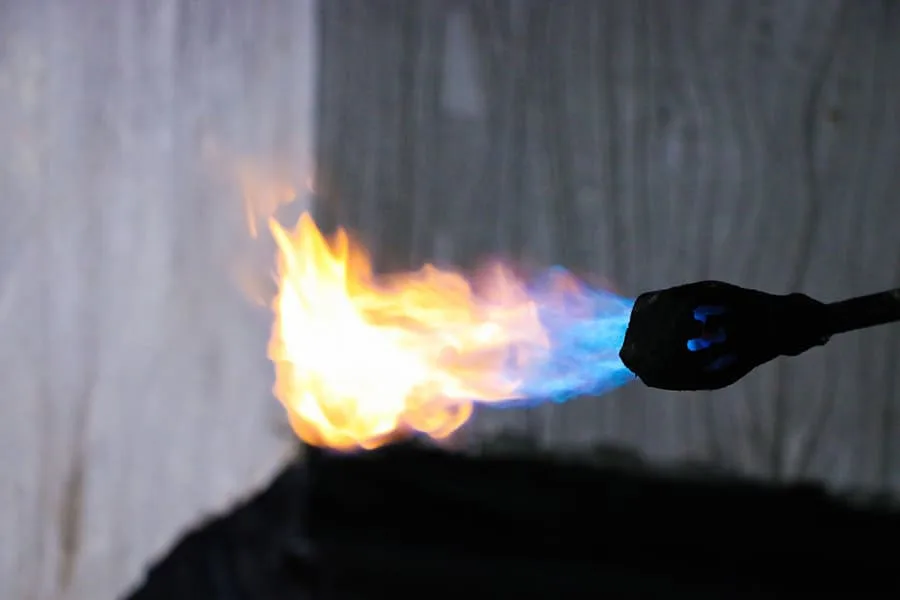 Aplicar fuego a material