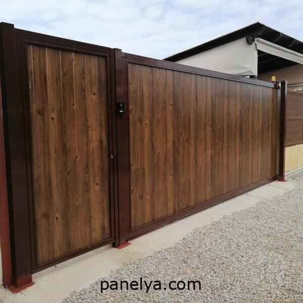 Puerta corredera de panel sándwich fachada imitación madera de 40mm